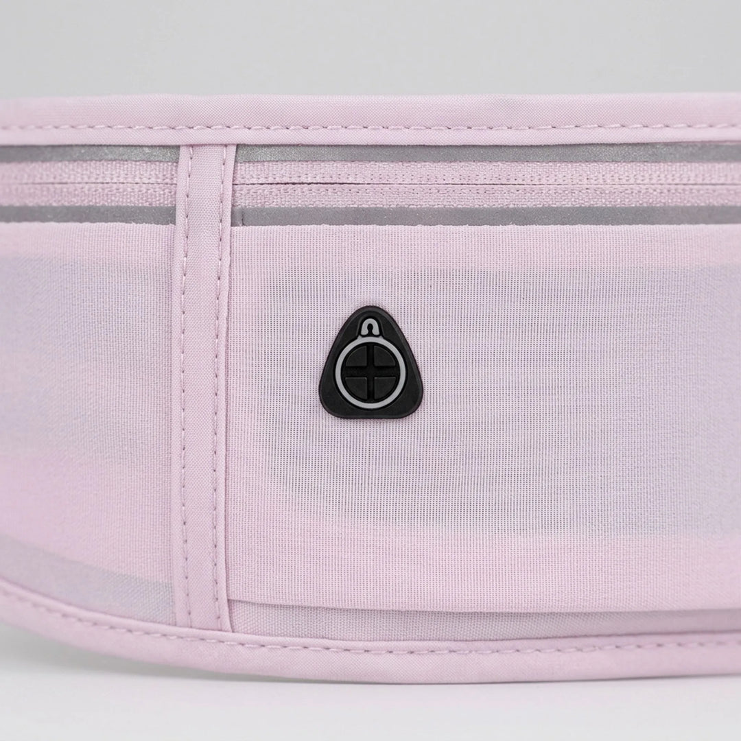 Activewear accessory: Unisex waist bag for running, gym, & travel. Slim design with multiple storage pockets.