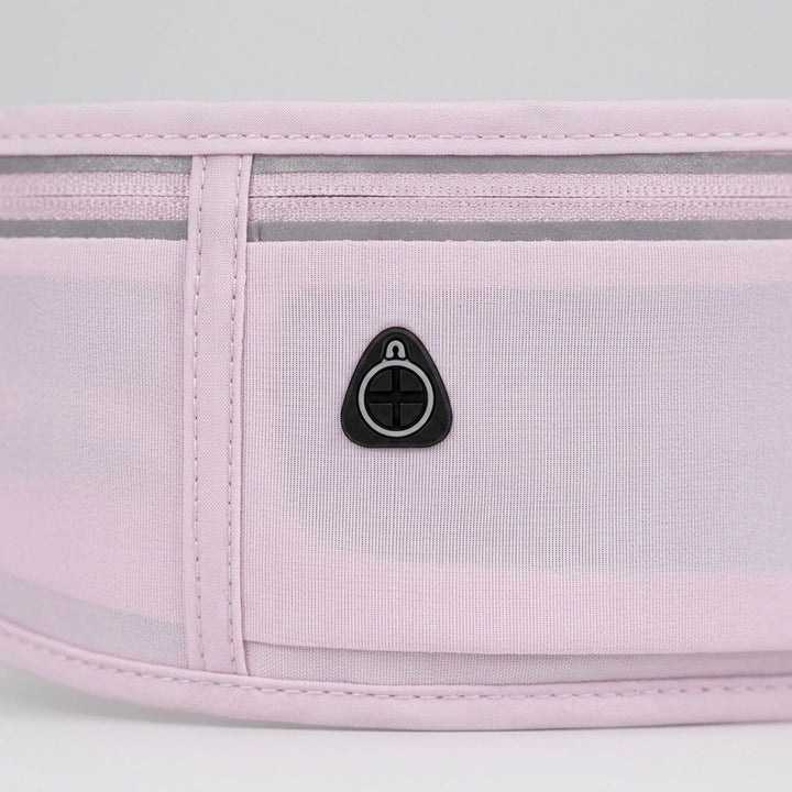 Activewear accessory: Unisex waist bag for running, gym, & travel. Slim design with multiple storage pockets.