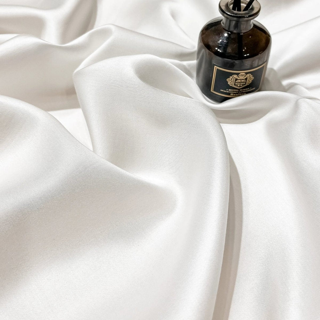 Comfortable unisex cotton bed linen, a deep pocket fitted sheet enhancing any bedroom's luxury.