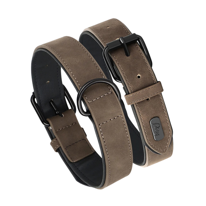 Unisex soft padded PU leather dog collar for comfort & durability, solid black with metal buckle.