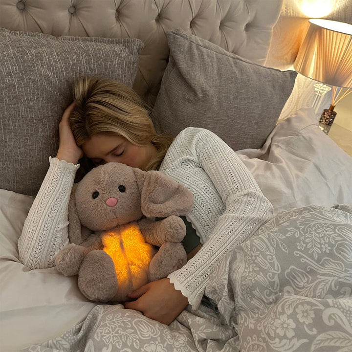 Comforting plush toy featuring gentle light, serving as a relaxation aid and stress relief for all ages.