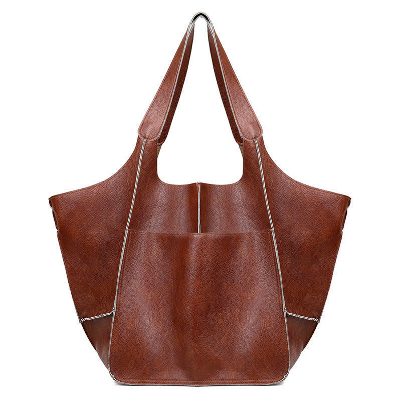 Unisex spacious travel duffel bag, perfect for weekend getaways and short trips.