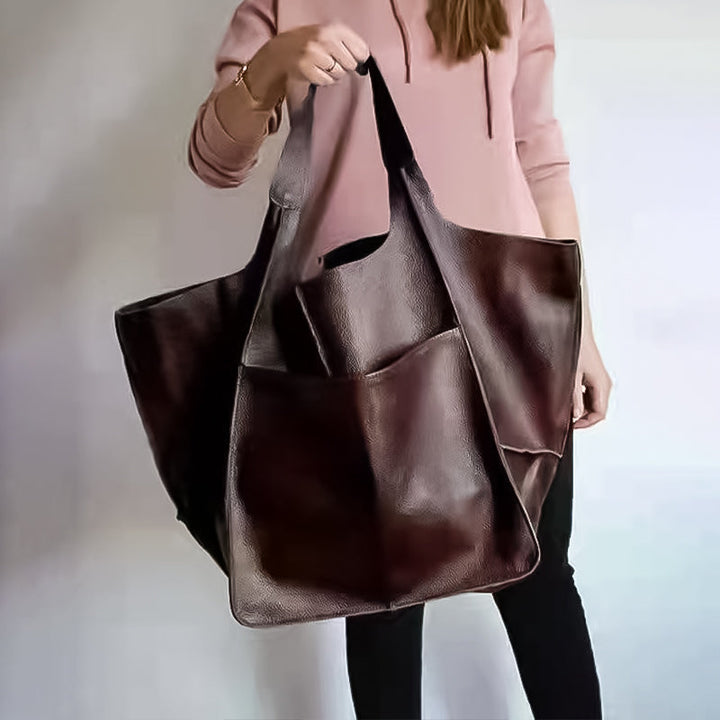 Elegant weekend duffel, spacious design for stress-free travel.