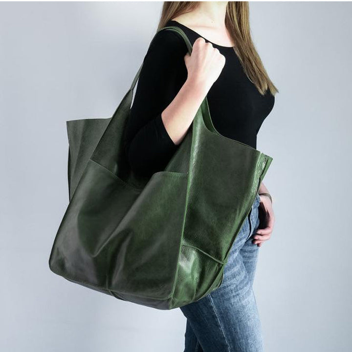 Practical unisex carry-all, large capacity travel bag for daily use or trips.