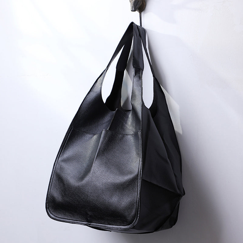 Functional shoulder travel bag, offering ample space for all your belongings.