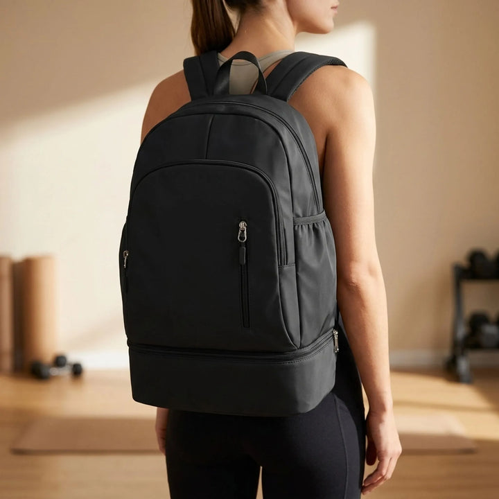Unisex sports backpack, black, with a separate shoe compartment, perfect for gym or travel.