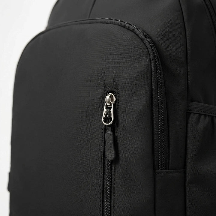 Black unisex gym bag with dedicated shoe compartment, ideal for athletes, daily commute, or travel.