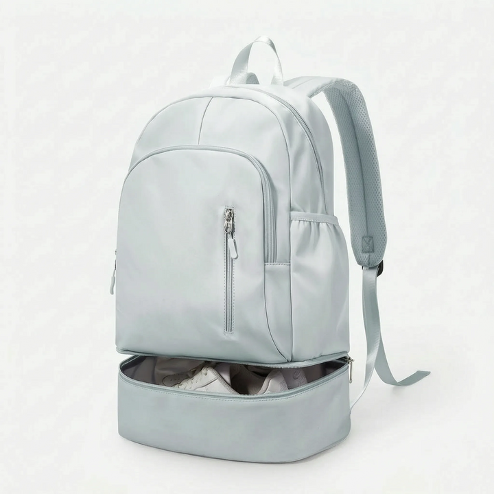 Organized unisex backpack for sports & travel, showing interior compartments including the shoe section.