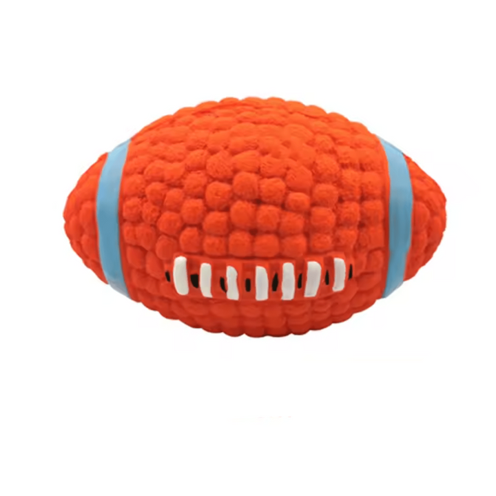 Hand holding a robust squeaky latex dog toy ball, showcasing its quality.