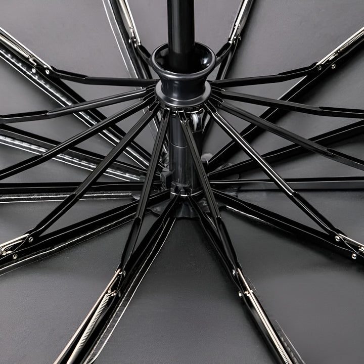 All-weather StormShield folding umbrella: strong windproof frame & reliable UV sun protection. Compact design.