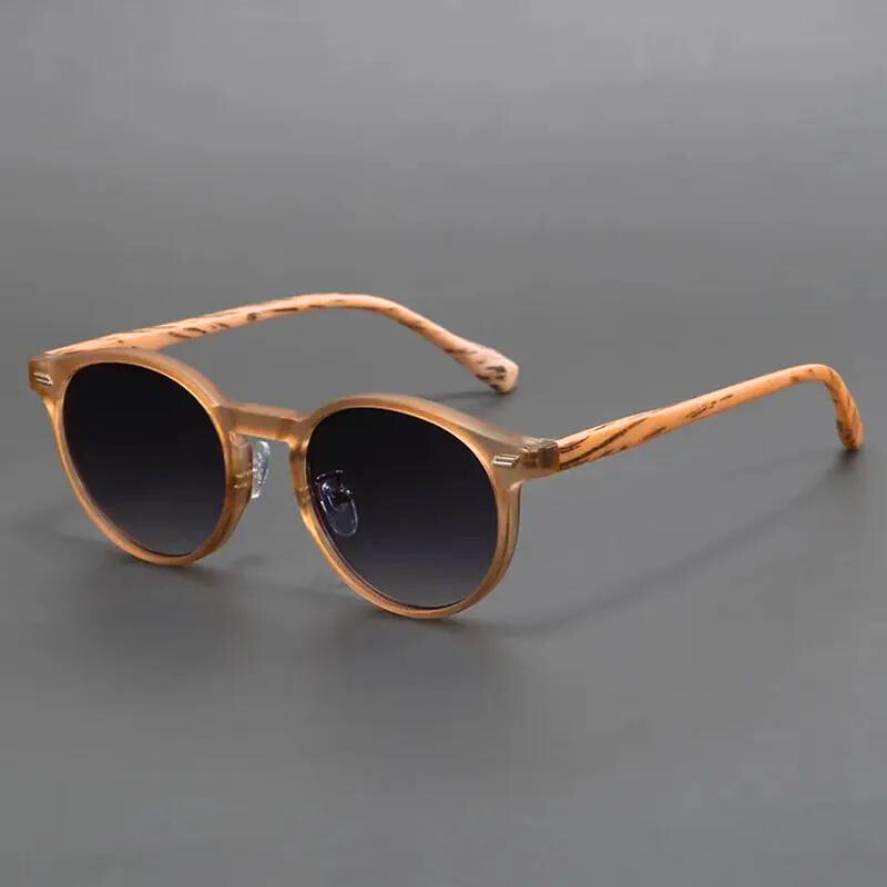 Classic round sunglasses for men & women, featuring UV protective lenses & a chic design. Ideal for daily fashion eyewear.