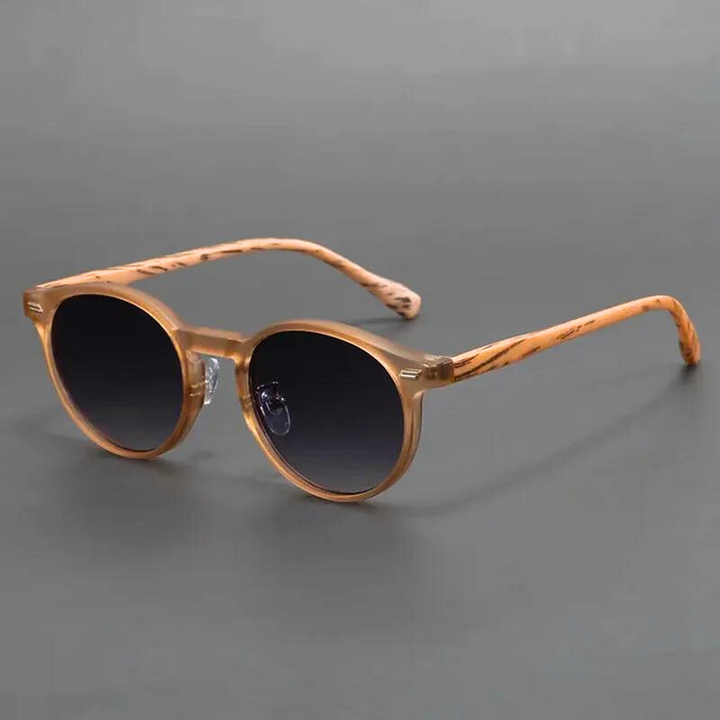 Classic round sunglasses for men & women, featuring UV protective lenses & a chic design. Ideal for daily fashion eyewear.