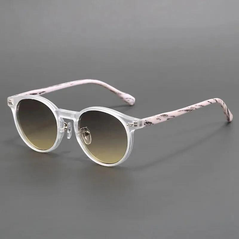 High-quality stylish round sunglasses, unisex, with full UV protection. A durable and essential summer fashion accessory.