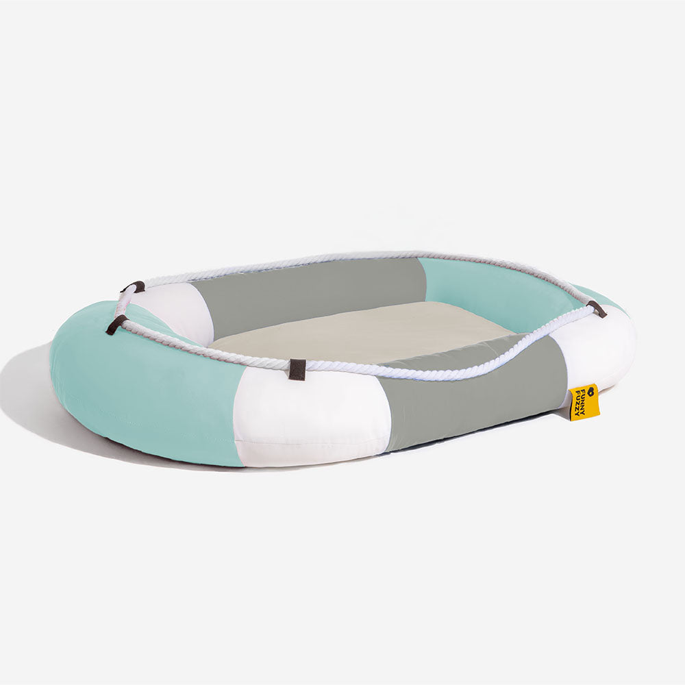 Stylish blue boat-shaped pet bed, waterproof and cooling for pets