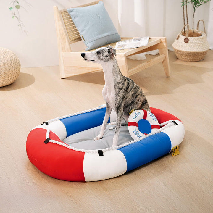 Waterproof boat-shaped cooling pet bed in blue, ideal for summer comfort