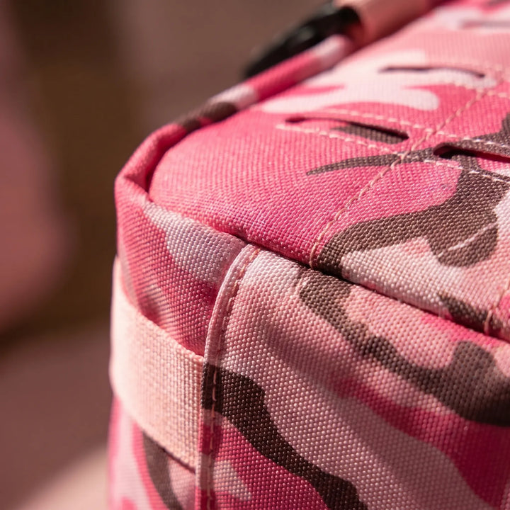 Rugged hiking backpack, a tactical MOLLE daypack for outdoor gear with ample storage and laser-cut design.
