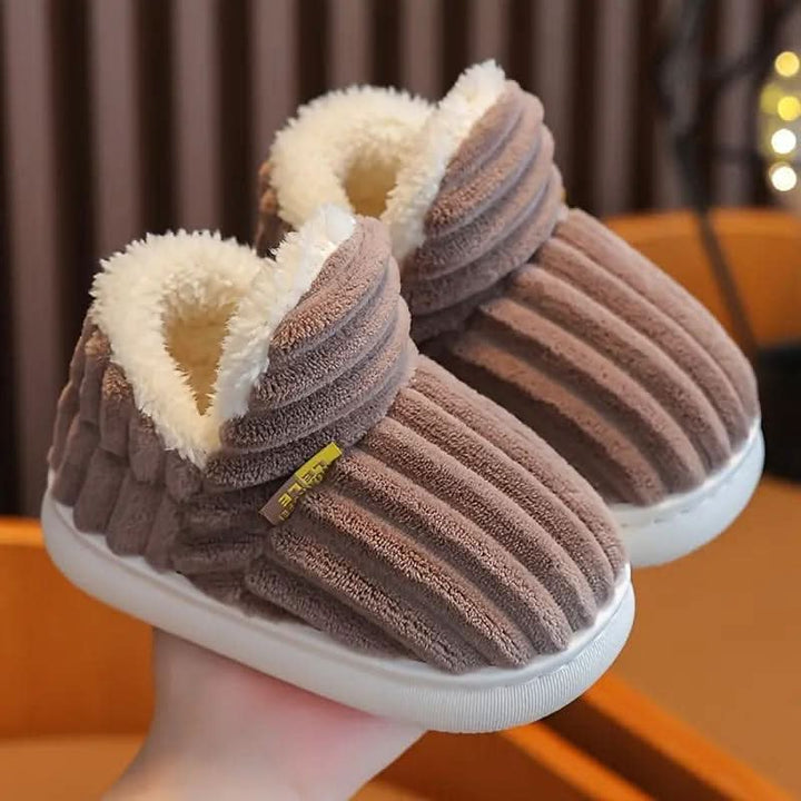 Soft, warm indoor thermal slippers for unisex wear during cold winter months.