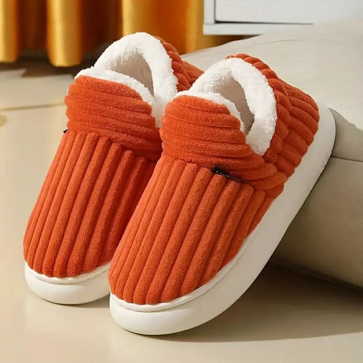 Easy-care thermal house slippers, plush and warm for unisex winter comfort.