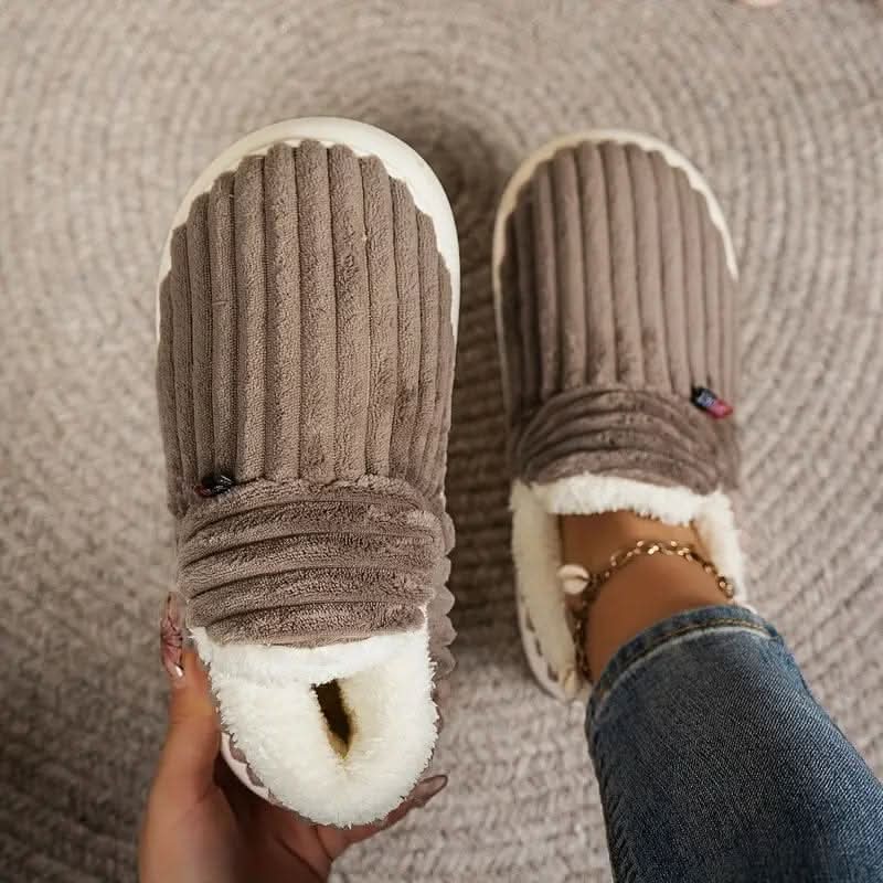 Indoor thermal slippers with non-slip sole, ensuring safe and cozy winter warmth for all.