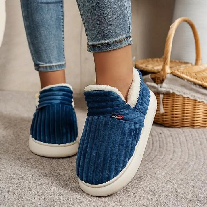 Close-up of a plush thermal house slipper, offering cozy comfort and warmth for winter.