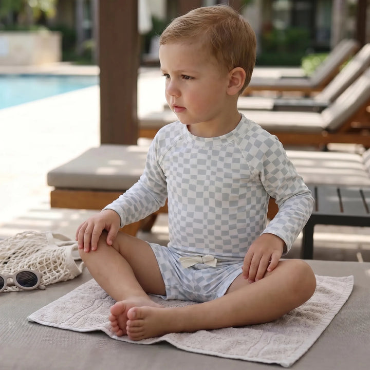 Unisex toddler long sleeve swimwear set with sun protection. Perfect for kids' beach and pool play.