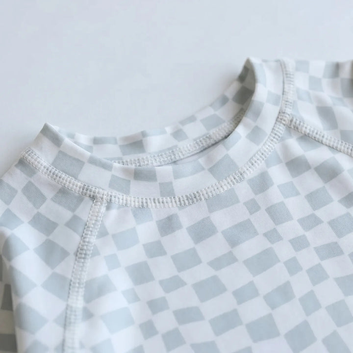 Comfortable two-piece long sleeve toddler swimwear set for active kids. Ideal for summer pool and beachwear.