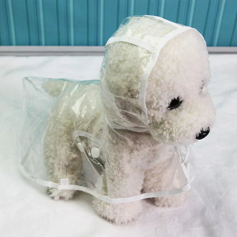 Transparent dog raincoat folded neatly, showcasing its portability. All-weather dog clothing.