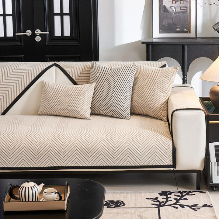 Full view of non-slip unisex two-tone herringbone fleece couch cover on a sofa