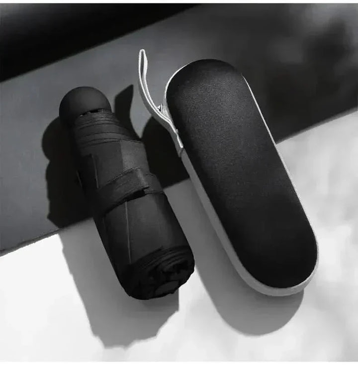 Stylish capsule umbrella, lightweight & compact, offering reliable weather protection on the go.