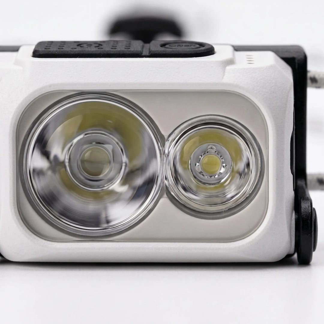 Ultra-lightweight rechargeable headlamp for outdoor adventures, providing bright LED light on the go.