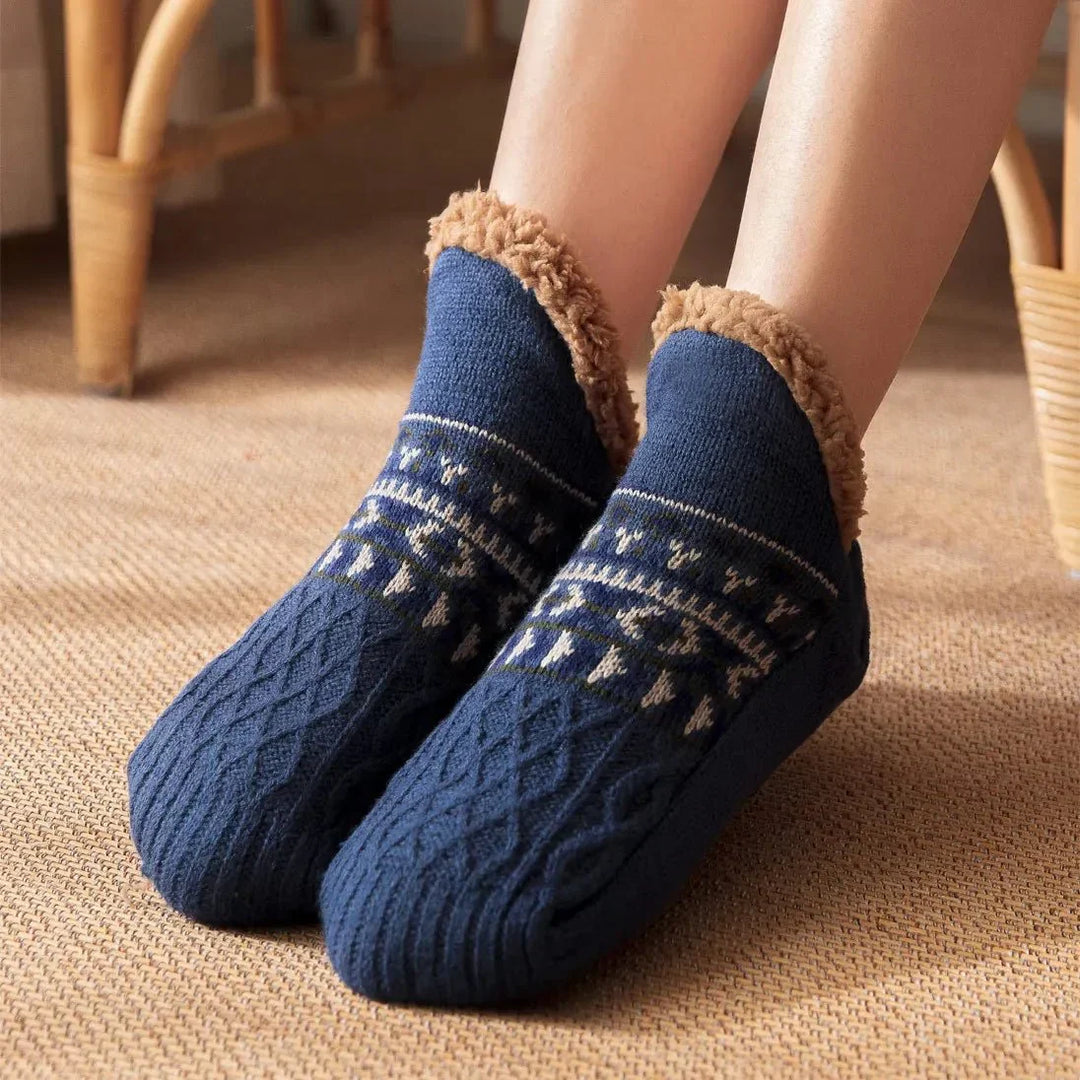 Soft winter socks with non-slip grip, providing warm indoor comfort for all genders.