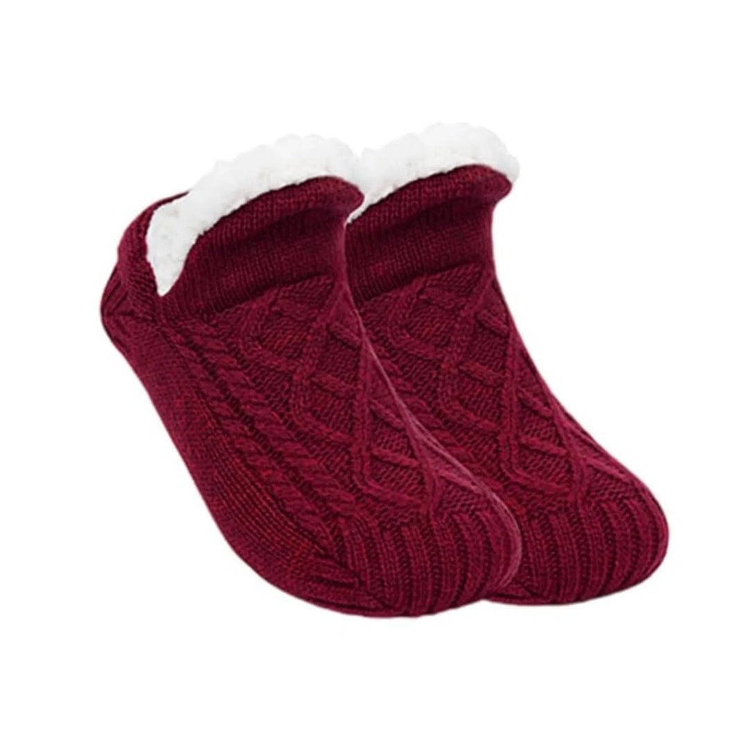 Premium ultra-soft house socks for men & women, ensuring cozy sleep & warm feet.