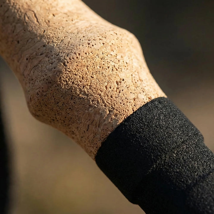 Adjustable hiking trekking poles, ultralight & durable, designed for comfort on long trail walks.