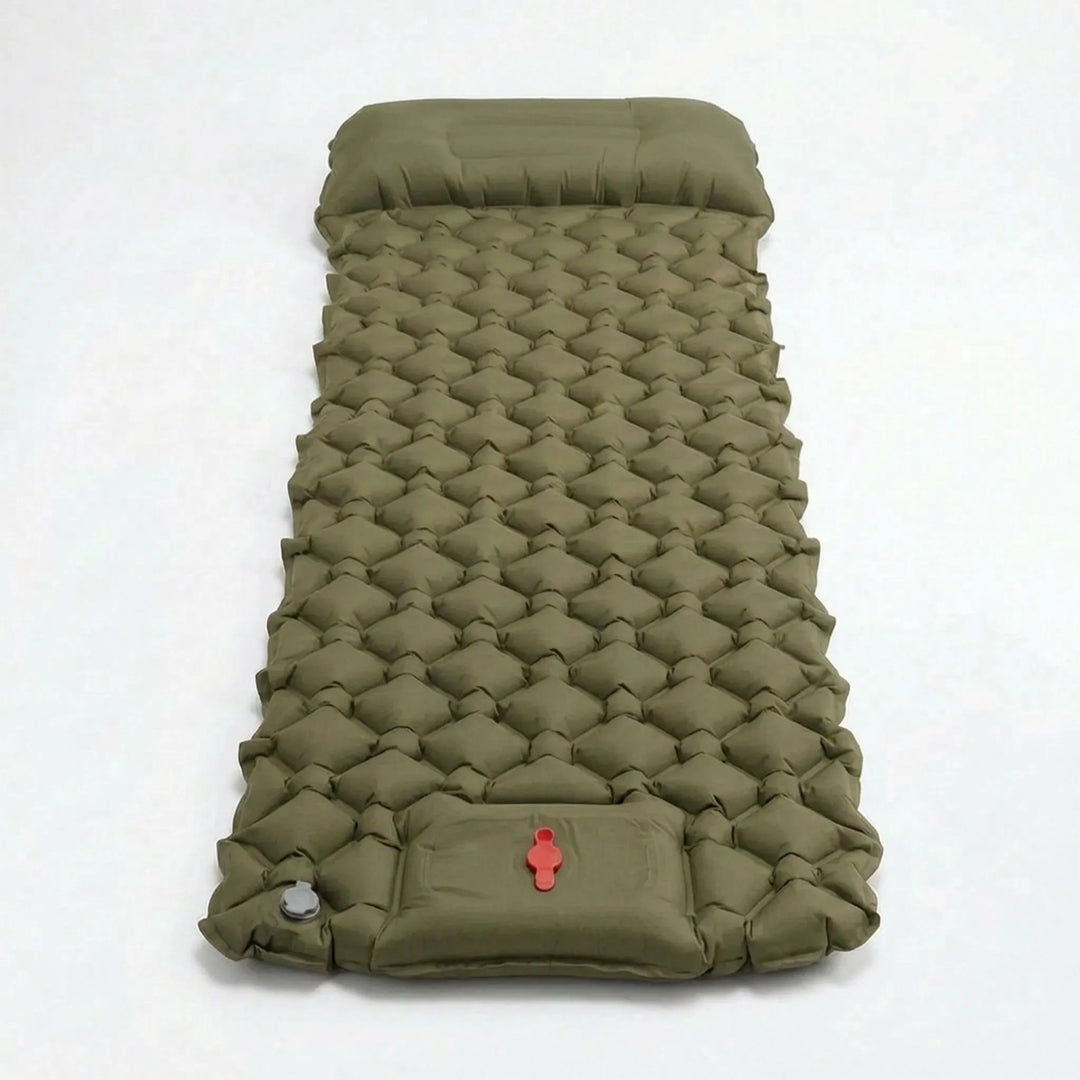 Inflated ultralight sleeping pad in a tent, showing built-in pump. Ideal for camping, hiking, and travel comfort.