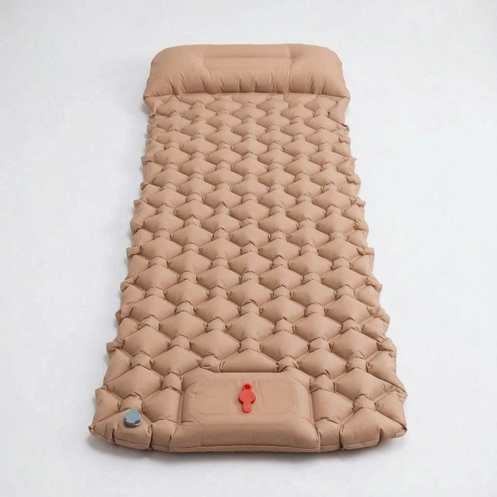 Folded ultralight camping sleeping pad. Compact, with built-in pump & pillow for easy backpacking and travel.