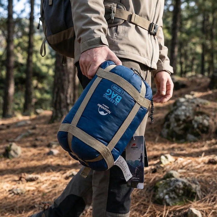 Unisex ultralight compact summer sleeping bag for hiking and backpacking.