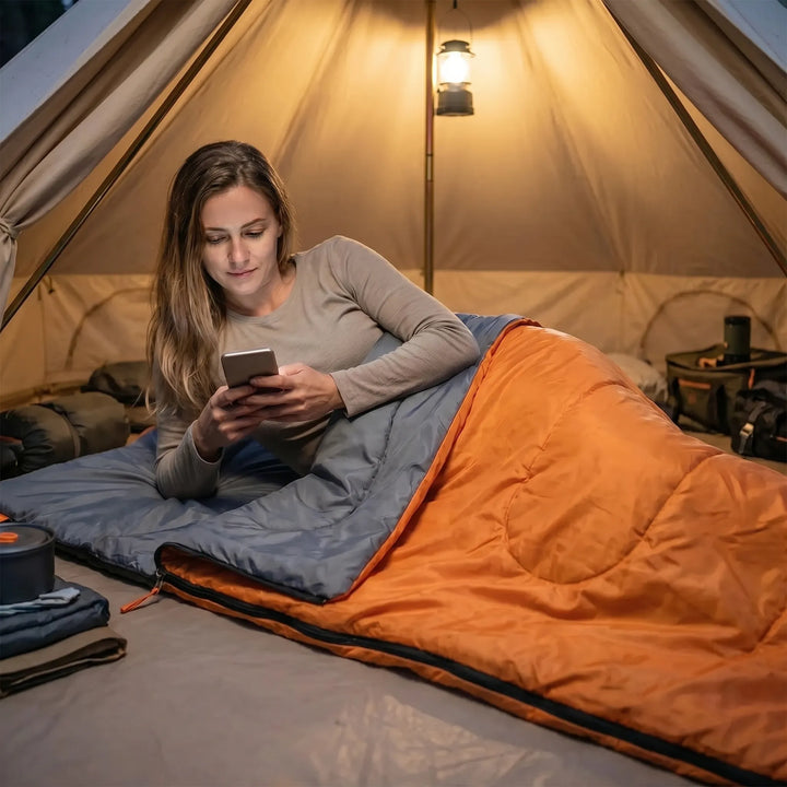 Unisex ultralight envelope sleeping bag for camping, hiking & travel. Compact, portable adult outdoor gear.