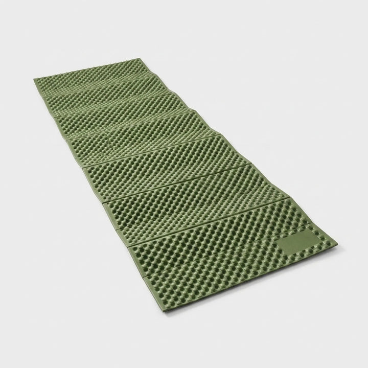 Durable foam sleeping pad provides essential comfort for camping & outdoor adventures. Ultralight backpacking mat.