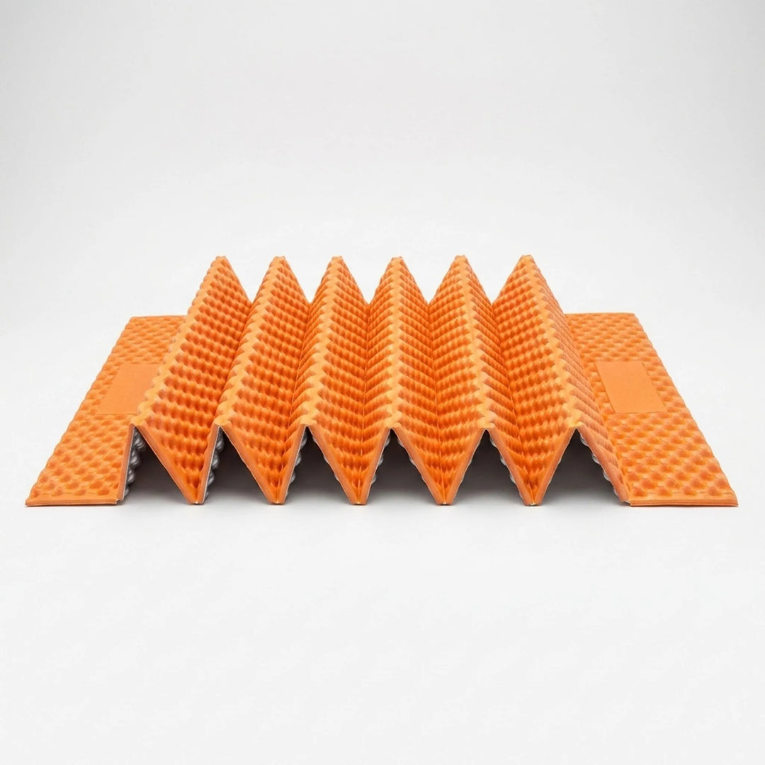 Compact ultralight foam sleeping pad, perfect for backpacking & camping. Essential outdoor gear for hikers.