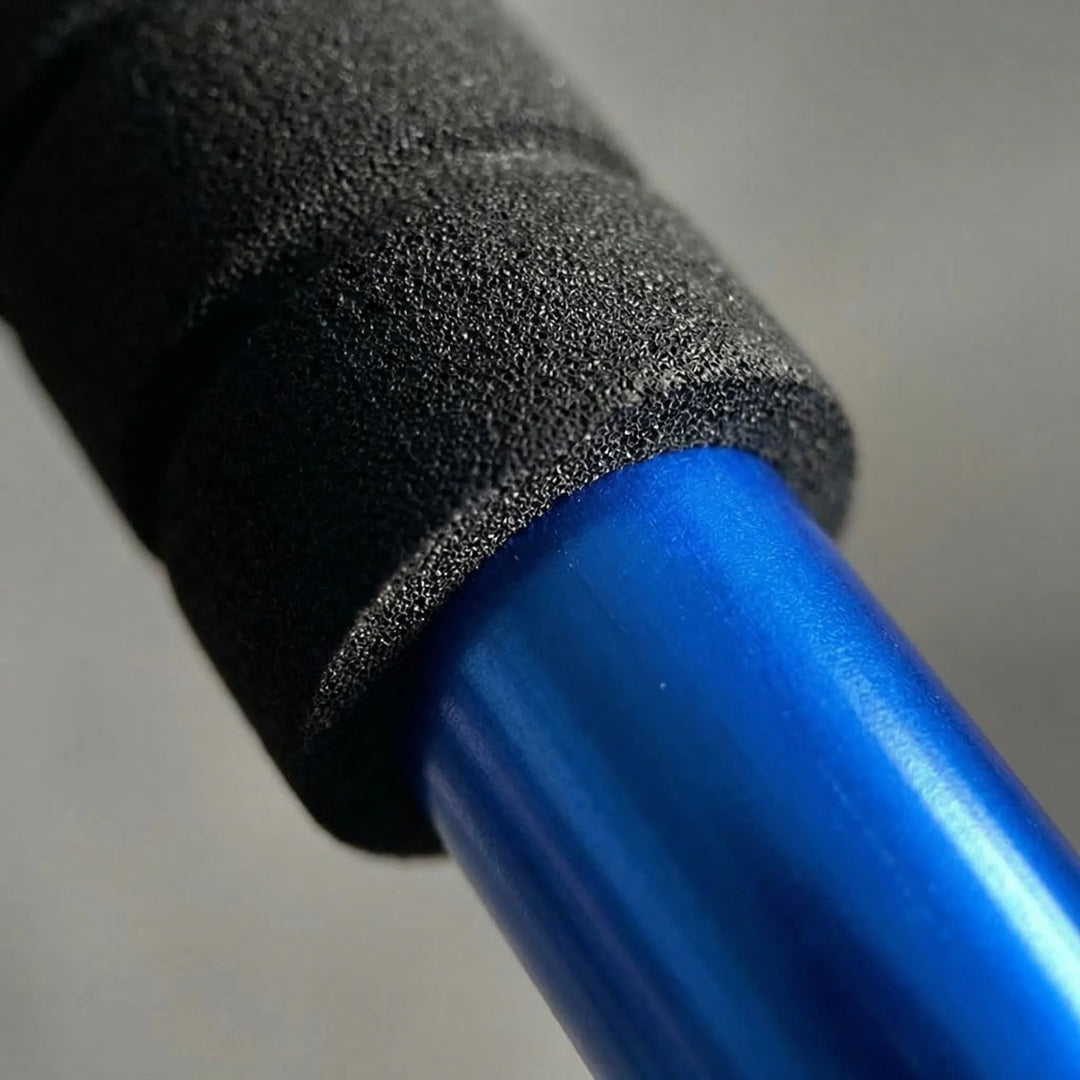 Unisex hiking pole in use on a trail, providing stable support for backpacking and outdoor adventures.
