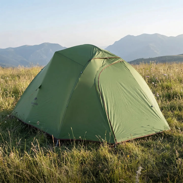 Freestanding ultralight dome tent on a flat surface, demonstrating easy setup & repositioning for outdoor gear.