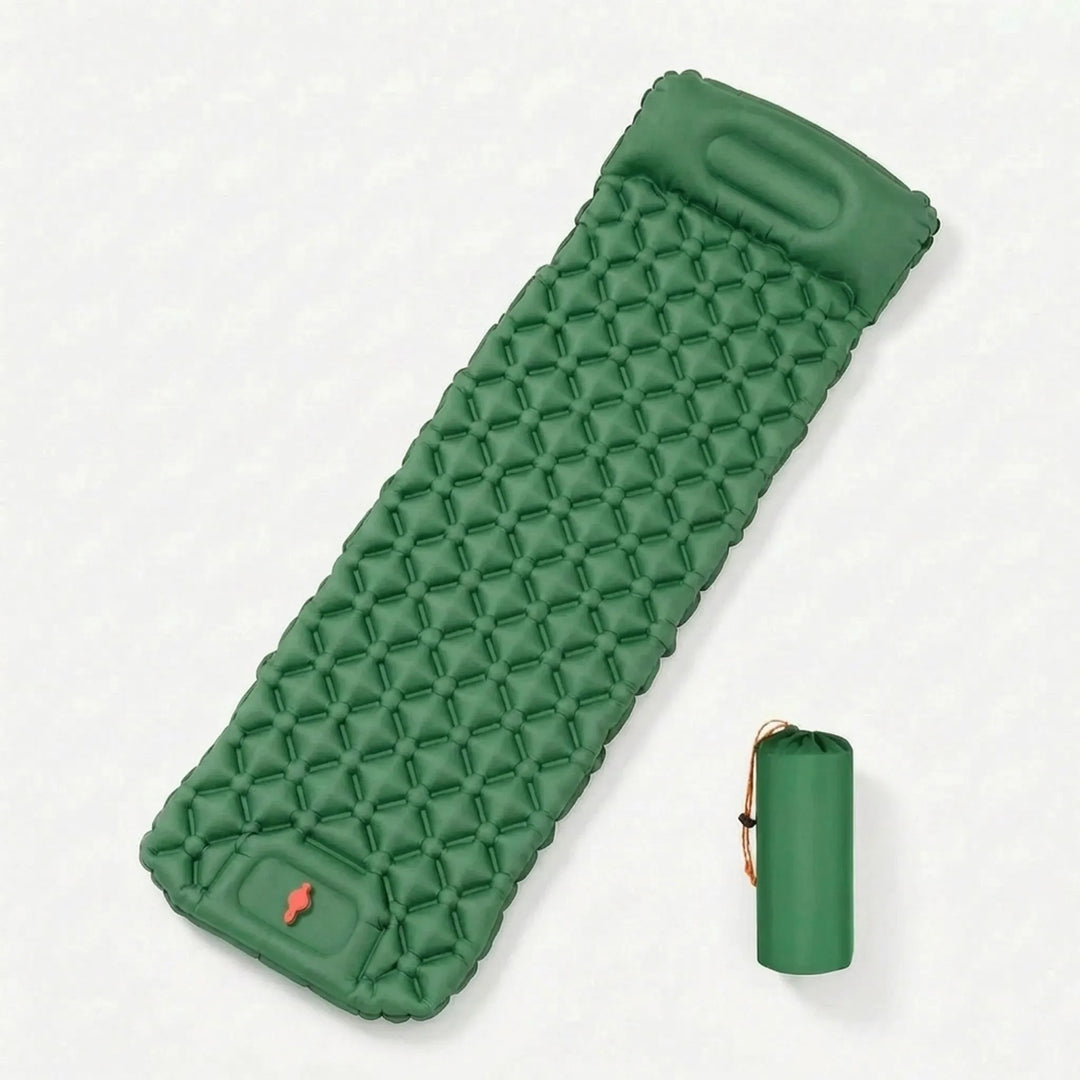 Hiker unpacking ultralight inflatable sleeping pad for a comfortable night camping outdoors. Compact travel gear.