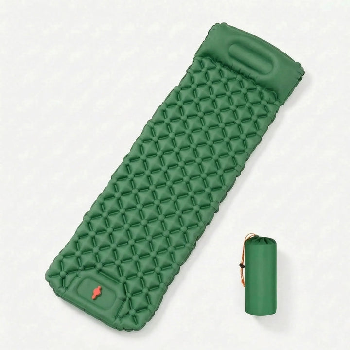 Hiker unpacking ultralight inflatable sleeping pad for a comfortable night camping outdoors. Compact travel gear.