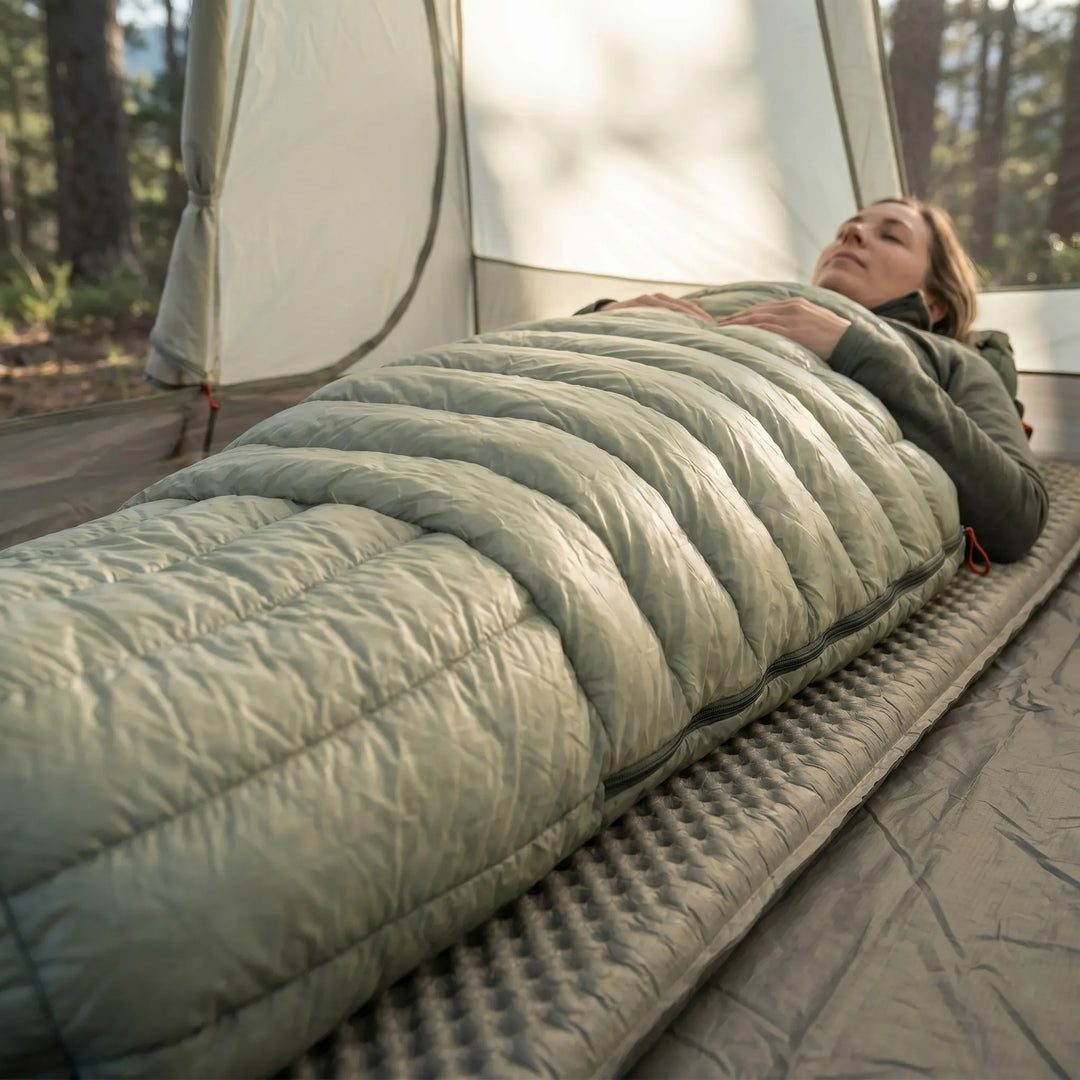 Warm mummy down sleeping bag, ultralight & compact for backpacking gear. Ideal for outdoor adventures.