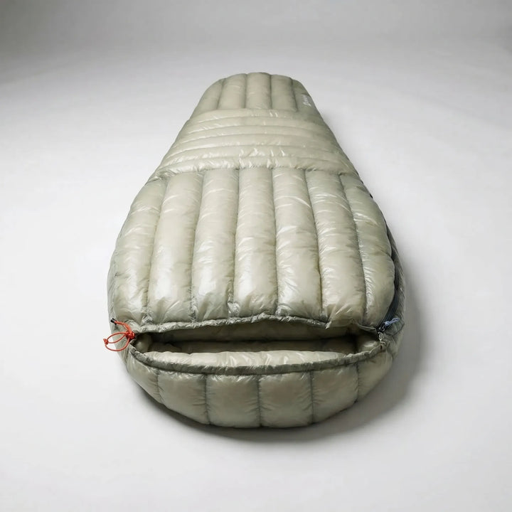 Backpacking ultralight down mummy sleeping bag. Provides warmth & comfort for camping & hiking.