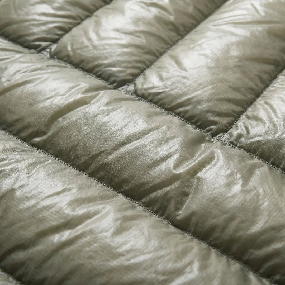 Compact & ultralight unisex mummy down sleeping bag for backpacking. Essential gear for outdoor warmth.