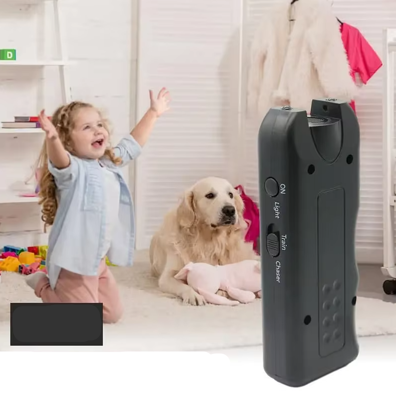 Portable pet trainer with ultrasonic sound and bright LED light for dog safety.