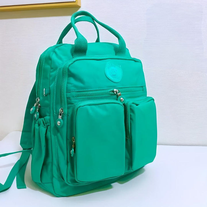 Modern waterproof urban backpack with numerous pockets, designed for unisex daily travel.
