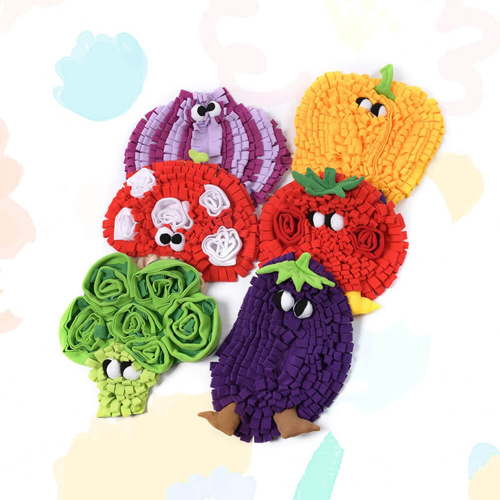 Dog snuffle mat with colorful vegetable theme, promoting interactive foraging & mental stimulation.