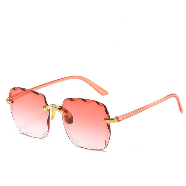 Trendy unisex vintage rimless sunglasses, square lenses, lightweight for summer style & UV400 protection.
